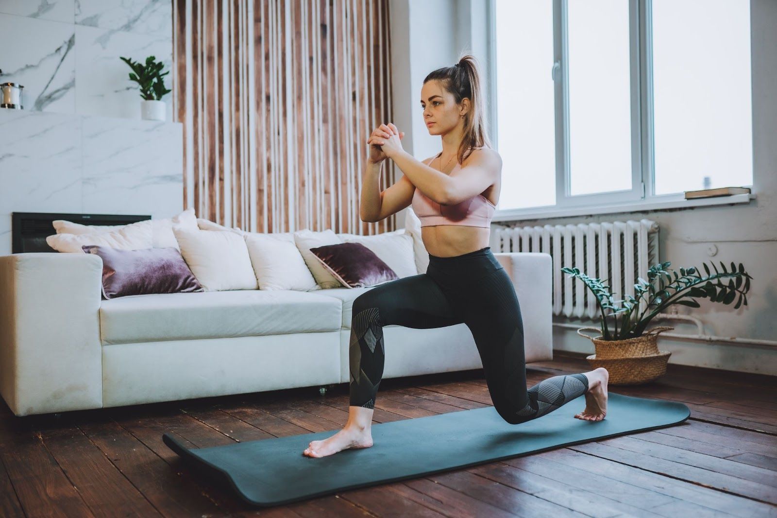 an athlete working out in the living room